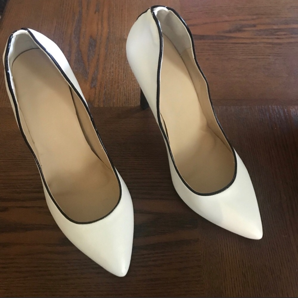 White pumps with black trimming